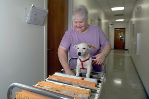 Judy Sizemore delivers mail with Alex