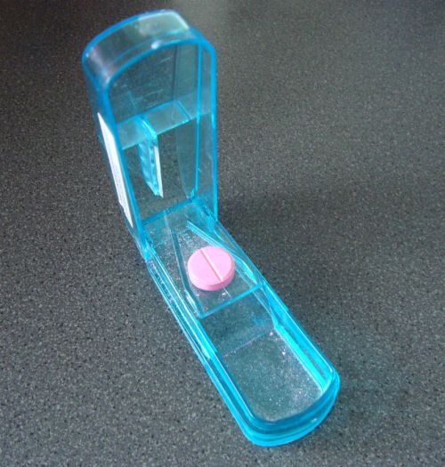 Place the bill in the base of the splitter