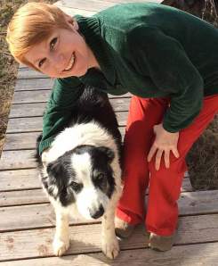 Emotion researcher Christine Harris, professor of psychology at UC San Diego, with Samwise, one of three border collies to inspire the study on dog jealousy. Photo by Steve Harris.