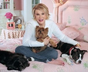 An earlier photo of Ms Rivers with her dogs (photo originally from Architectural Digest)