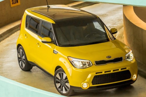 The Kia Soul - "This stylish urban cruiser offers rear-seat heat and an extra-large panoramic roof for lots of sunlight. Its boxy and efficient shape also allows for plenty of headroom, so even though the Soul is compact, it comfortably accommodates big and tall dogs. The large rear hatch is also a plus for quick entry and exit."