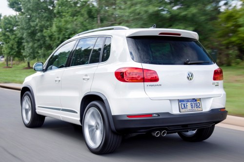 The Volkswagen Tiguan - "got its name by combining the words tiger and iguana, so the car's sure to be pet-friendly. The Tiguan is a lot like the Nissan Juke: compact on the outside but deceivingly spacious within. The rear seats fold flat, making room for pets of almost any size, and an optional dog barrier keeps your pet safely contained where it can't distract you.'