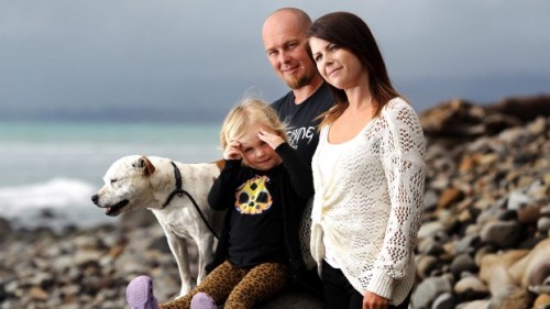 Waitara man Marc Glover, partner Alicia James and their 3-year-old daughter Saphire-Rose, are over the moon that their dog, Chaos, was found after going missing for eight days. (Photo by Sam Scannell, Fairfax NZ)
