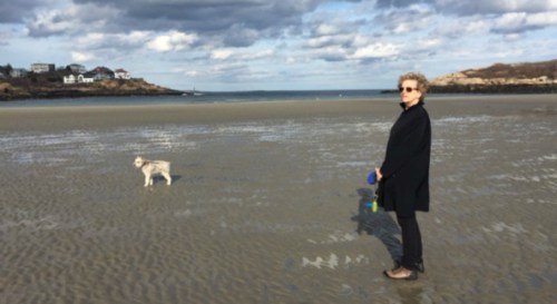 Boston journalist Anita Diamant pictured with Buddy at Good Harbor Beach in Gloucester, Mass., winter 2013. (photo by Ms Diamant)