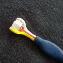 Triple headed dog toothbrush