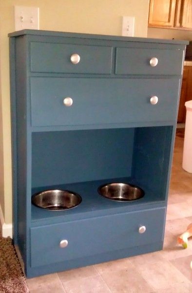 Raised dog bowls in chest of drawers